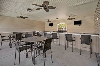 Pool house cabana with outdoor kitchen/grilling pavilion